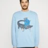 Lacoste X Netflix - Sweater - Light Blue