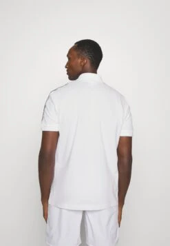 Lacoste Sport Tapered - Poloshirt - Blanc -Lacoste 0c79a44981ed4b319ea4e3d25e539860