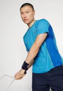 Lacoste Sport Tennis Tour - Sport T-Shirt - Bleu Jaune -Lacoste 1d2088a68b8446dc84b1cd9373f747d5