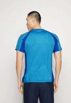 Lacoste Sport Tennis Tour - Sport T-Shirt - Bleu Jaune -Lacoste 2db1e1a30fe54680a2d21ae8b8c2aae3