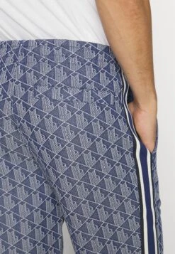 Lacoste Monogram Trackpant - Trainingsbroek - Methylene/Flour -Lacoste 36d87d56121c412fb7005b4c2b5f9c42