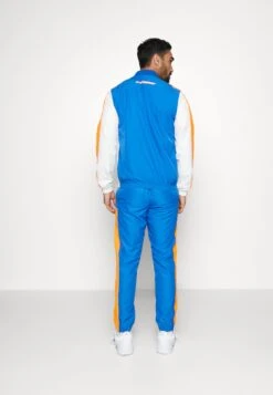 Lacoste Sport Tracksuit - Trainingspak - Kingdom/Flashy Orange-Flour -Lacoste 3f937bf1b8e04a839a77f38b45ab44de
