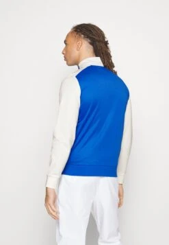 Lacoste Sport Tennis Jacket Tapered - Trainingsvest - Kingdom/Flour-Flour-Kingdom -Lacoste 434ecf3e57404dd584b495eb3b280966
