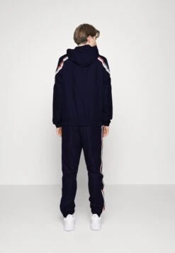 Lacoste Sport Tennis Jacket Tapered - Trainingsvest - Navy Blue/Flashy Orange Flourecend -Lacoste 6341e033db4842d1be54a882cbd81091