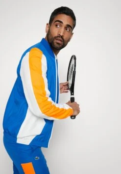Lacoste Sport Tracksuit - Trainingspak - Kingdom/Flashy Orange-Flour -Lacoste 69c187fa68474694b0d91a8908cd4f35