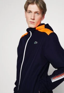 Lacoste Sport Tennis Jacket Tapered - Trainingsvest - Navy Blue/Flashy Orange Flourecend -Lacoste 6b9066892c514832b19afd75b8bb376a