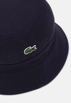 Lacoste Unisex - Hoed - Navy 7 Lacoste Unisex - Hoed - Navy -Lacoste 78d42a3b95464ee89ac2e6a825d34778
