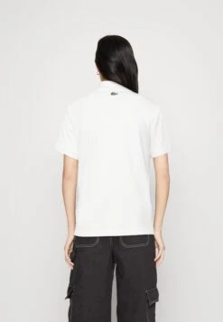 Lacoste X Netflix - Poloshirt - White -Lacoste 87ca986e546c40baa4feae15a0c7ac62