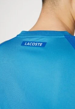 Lacoste Sport Tennis Tour - Sport T-Shirt - Bleu Jaune -Lacoste 8ea4ba54eaaa4f9c973430011f83c171