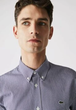 Lacoste - Overhemd - Blanc / Bleu Marine 9 Lacoste - Overhemd - Blanc / Bleu Marine -Lacoste c06eadf75862449b8091adca726e350f