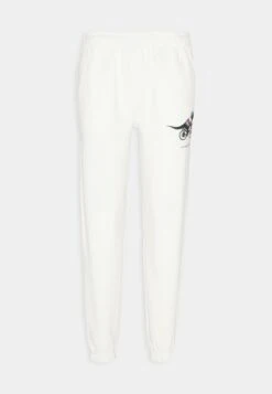 Lacoste X Netflix - Trainingsbroek - Flour -Lacoste d5c2ccd54db2426494387e388b47c542